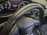 the steering wheel of a car is shown with a dash light on