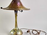 une image représentant une lampe à laquelle est attaché un cordon