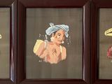three framed pictures of women with hats on their heads in a room
