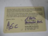 a close up of a business card with a handwritten name