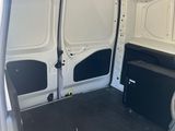 a white van with a black door and a black floor
