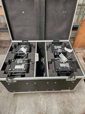 two suitcases that are open on the ground