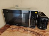 a microwave and a toaster sitting on a counter