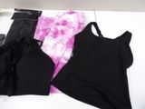 a black tank top, black pants, and a pink tie dye top