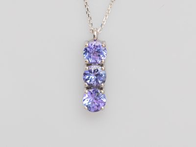 tanzane tanzane and white topaze three stone pendant