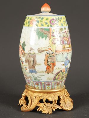 an image of a vase with a gold base on a black background