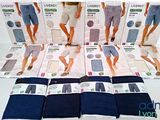 de nombreux shorts pour hommes sont exposés dans le magasin