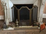 a fireplace with a fire place in it in the middle of a room
