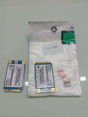 two pieces of electronic equipment sitting on a table