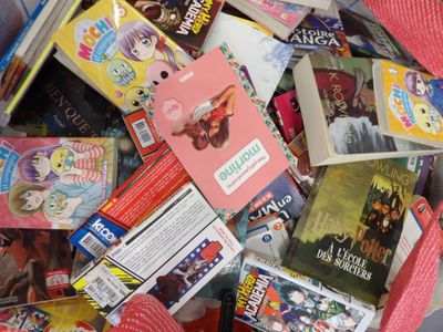 a basket full of children ' s books and dvds