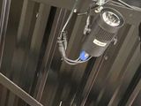 a picture of a metal structure with a light on it