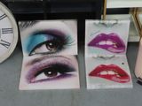 a clock that is next to a picture of a woman ' s eyes