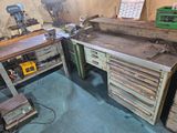a workbench with a lot of tools on it