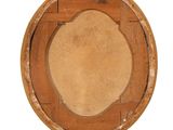 a picture of an old wooden plate with a hole in it