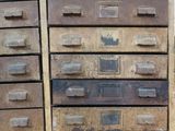 many drawers that are stacked on top of each other