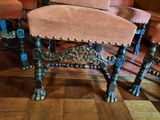 four chairs that are sitting on a wooden floor