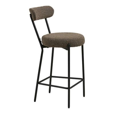 le dossier d'un tabouret de bar dont l'assise est recouverte d'un tissu marron