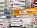 many different types of pens and pencils in this case