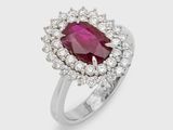 an oval ruby and diamond ring