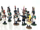 a lot of toy soldiers that are standing on a table
