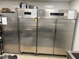 three stainless steel refrigerators in a kitchen next to each other
