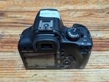 a camera that is sitting on a wooden table
