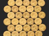 une pile de pièces d'or sur fond noir