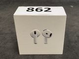 a box with a pair of airpods in it