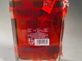 a bottle of liquor that is sitting on a table