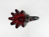 silver and red ring with a leaf design