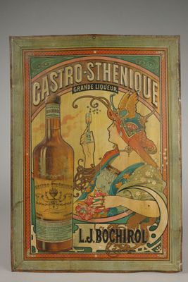 un vieux livre sur lequel figure l'image d'une femme tenant une bouteille d'alcool