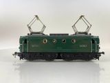 an image of a green train on a white surface