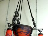 a chandelier hanging from the ceiling in a room