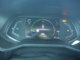 the dashboard of a car with a digital display on it