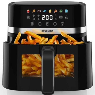 a close up of an air fryer with french fries in it