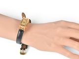 someone is wearing a watch on their wrist on a mannequin hand