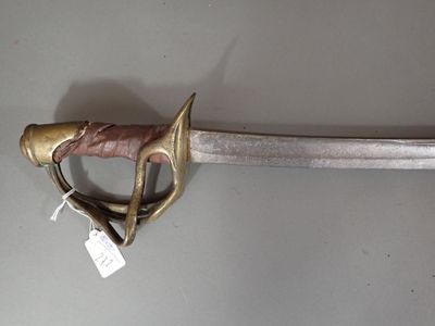 a sword that is on display on the wall
