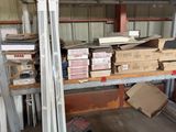 many boxes and boxes on the shelves in the warehouse