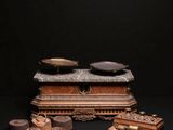 an assortment of wooden objects including a box, tray, and other items