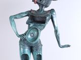 statue of a woman with a snake on her head and a snake on her back