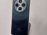 an image of a close up of a cell phone on a stand