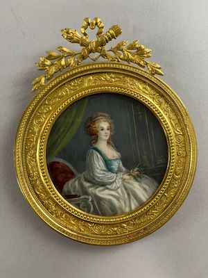 portrait of a lady in a white dress in a gold frame