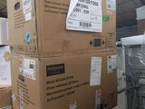 many boxes stacked on top of each other in a warehouse