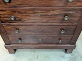 an image of a chest of drawers in a room