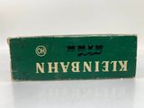 a green box with a white and black logo on it