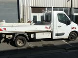 a white truck that is parked in front of a building