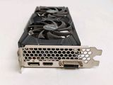 a close up of a video card sitting on top of a table
