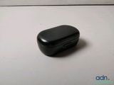 a small black case sitting on a white surface