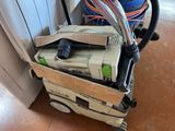 a vacuum that is sitting on top of a cart