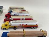 many toy trucks that are lined up on the table
